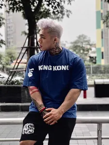 Camiseta deportiva azul oversize de algodón para hombre fitness y ropa casual diaria