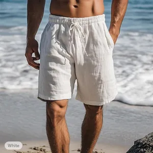 Premium men's white cotton linen beach shorts with drawstring elastic waist on model