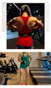 Detail of men's breathable cotton fitness stringer tank top shown in a gym setting