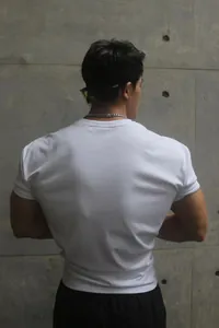 Back view of heavyweight white slim fit men's workout t-shirt in Sorona fabric.