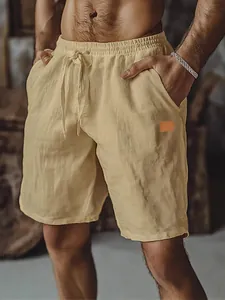 Men's breathable cotton linen shorts featuring a drawstring elastic waist for beach casual wear.