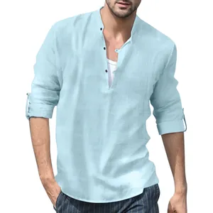 Light blue linen henley shirt detail with breathable fabric texture and stand collar.