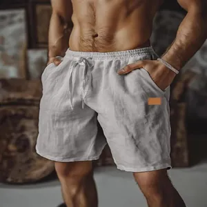 Men's breathable white cotton linen beach shorts with elastic drawstring waist design