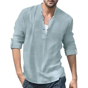 Close-up of light blue linen Henley shirt featuring stand collar and textured fabric detail