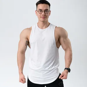 Front view of white muscle fit gym tank top on male model