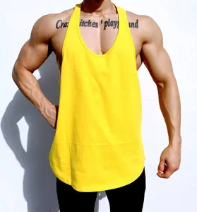 Detailed view of a men's yellow cotton fitness stringer tank top for intense gym workouts