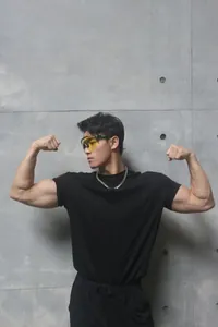 Fitness model wearing black slim fit crew neck gym training t-shirt