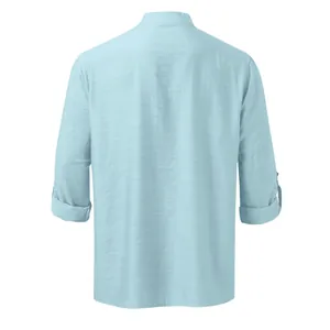 Back view of light blue linen Henley shirt with stand collar and rolled sleeves