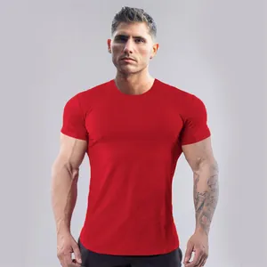 Front view of a slim-fit red cotton t-shirt for men on a muscular model