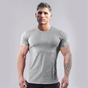 Detailed view of grey slim fit men's athletic T-shirt showing muscle fit design