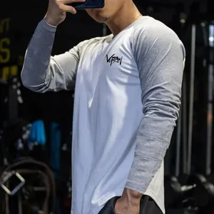 Men's athletic raglan long-sleeve T-shirt featuring a slim-fit color-block design for gym