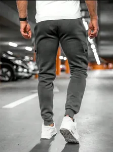 Schmale dunkelgraue Cargo-Jogginghose für Herren mit Taschendetails hinten und Bündchen