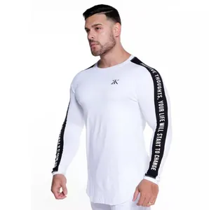 Detail of men's white compression fitness top with side sleeve text print