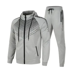 Grauer Herren-Trainingsanzug mit Wabenmuster, Kapuzenjacke und Jogginghose im Set.