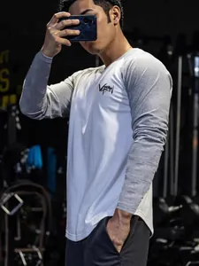 Men's raglan long-sleeve fitness t-shirt in white and grey color-block design