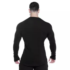 Back view of a men's black quick-dry compression long sleeve fitness shirt