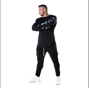 Athletic long sleeve compression shirt for men in breathable quick-dry black fabric