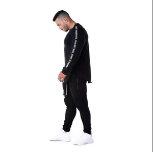Side view detail of men's black quick-dry long sleeve fitness training compression shirt
