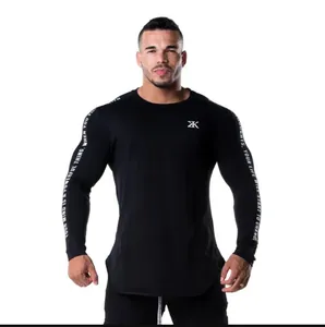 Detailed view of men's black muscle fit long-sleeve gym shirt with printed sleeves