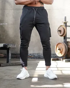 Detailed view of professional mens black slim fit cargo joggers for gym and running