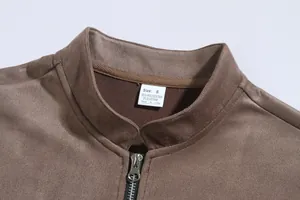 Detailed close-up view of the collar and brand label on a brown men's casual jacket
