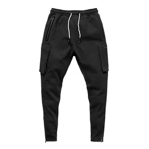 Detail view of men's black sports cargo pants with zippered pockets and drawstrings