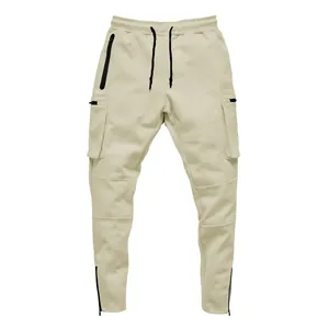 Detailed view of beige men's slim-fit cargo joggers with drawstring waist and pockets.