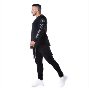 Full body view of men's athletic long-sleeve gym shirt in black with sleeve print