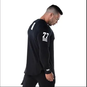 Men's black compression fitness long sleeve shirt with athletic sleeve graphics and slim fit