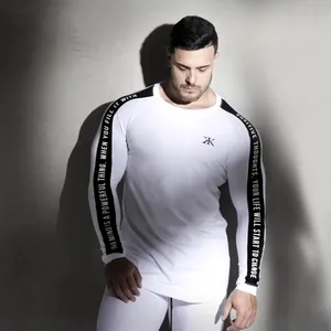 Men's athletic compression long sleeve training shirt in white with black sleeve print