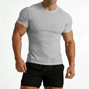 Close-up of men's slim fit grey gym t-shirt showing muscle definition