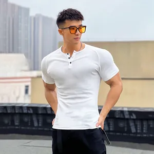 Detailed view of a white tight-fitting ribbed Henley T-shirt showing muscle fit texture.