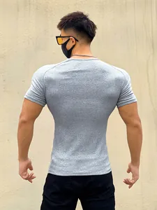 Men's grey ribbed muscle fit T-shirt back view for gym and training