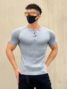 Men's slim fit muscle T-shirt with ribbed fabric for gym training and activewear.