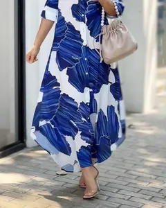 Robe chemise élégante à imprimé feuilles bleu et blanc avec col à revers et coupe