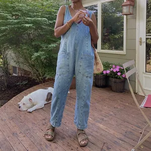 Lifestyle view of a vintage V-neck denim jumpsuit with large functional pockets