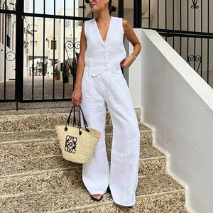 Elegante set due pezzi in cotone e lino bianco con gilet senza maniche e pantaloni larghi