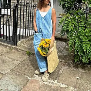 Casual denim overalls in an urban lifestyle setting with sunflowers