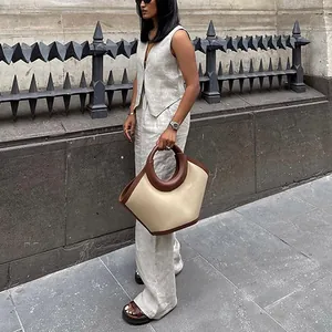 Elegante completo due pezzi in lino con gilet senza maniche e pantaloni lunghi