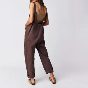 Detailed back view of brown adjustable denim overalls with pocket for women