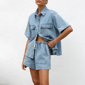 Model wearing a casual short-sleeve denim shirt and shorts two-piece set for summer