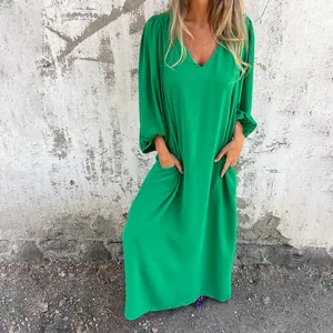 Vibrant green loose fit V-neck maxi dress featuring stylish lantern sleeves and pockets