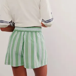 Back view of summer green and white striped casual shorts with elastic waistband.