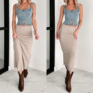 Detailed view of a sleeveless denim vest with front zipper and matching lace maxi skirt.