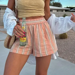 High-waisted striped casual shorts for women featuring pink and white vertical patterns
