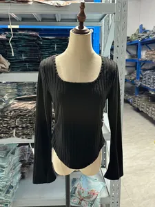 Black ribbed long sleeve T-shirt with square neck and curved hem on a mannequin model