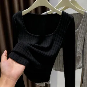 Macro detail of the soft ribbed brushed texture on a slim fit square neck top