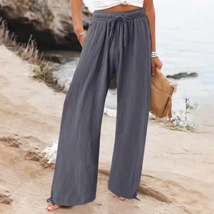 Casual women's wide-leg lounge pants in dark grey with a comfortable drawstring waist