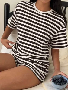 Detail view of women's casual striped lounge set featuring short sleeve tee and shorts