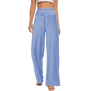 Pantaloni a gamba larga a quadretti bianchi e blu con coulisse in vita alta per comodità.